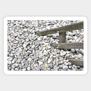 Pebbles covering a fence at  Sheringham, UK Sticker